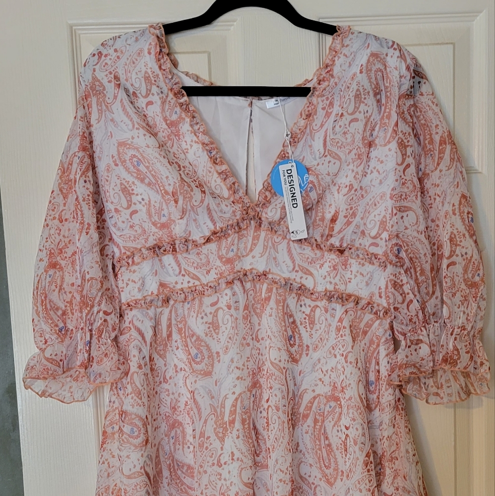 Brand new,  baby doll, pinkish paisley three quarter length sleeve mini dress.